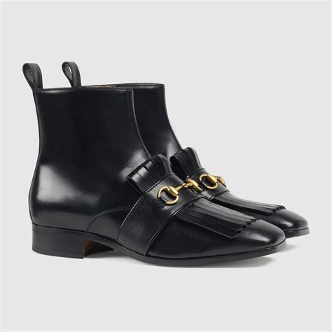 gucci fringed horsebit boots